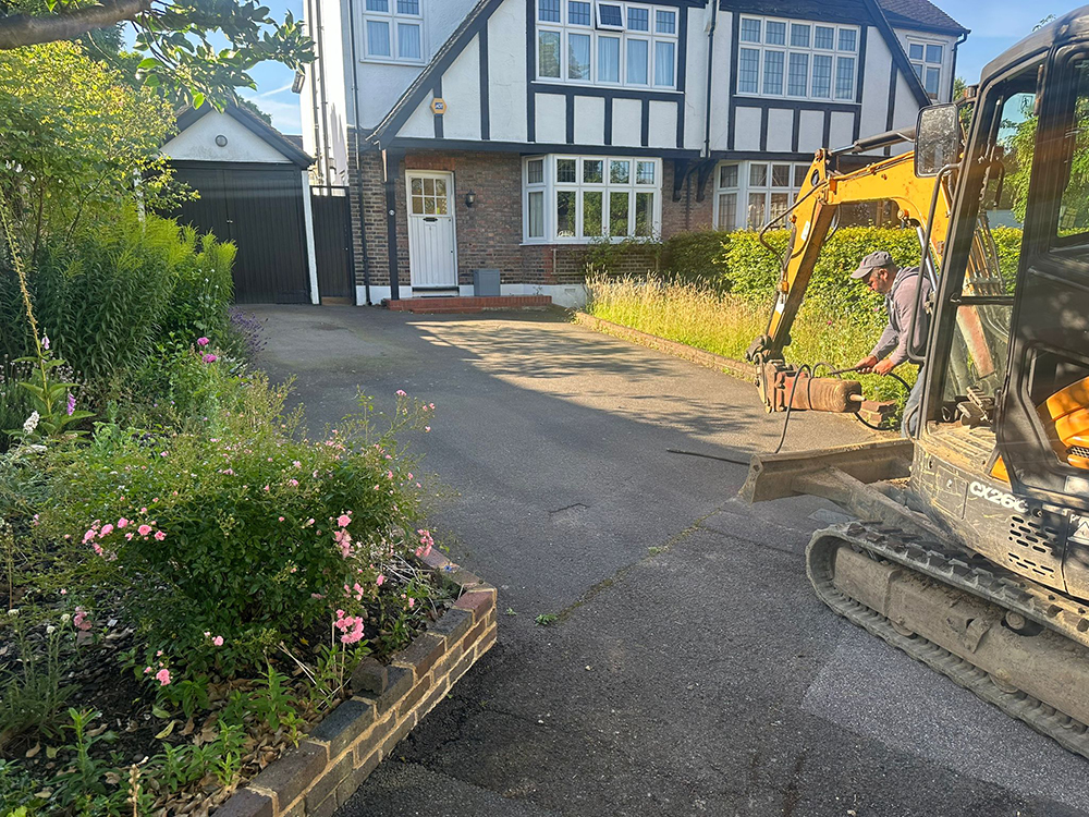 Before: Old driveway during excavation